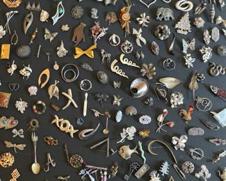 Over 100 pins / brooches 