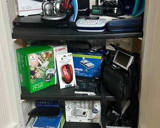 Gaming keyboard, computers, and tons of technology. 