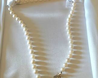 Pearl Necklace w/ small Diamond Chips by Designer's Fine Jewelry