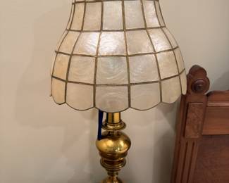 Capos she’ll and brass lamp
