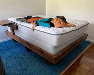 solid wood platform bed with attached nightstand