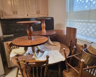Wood end tables with antler feet and dining table with extra leaves and lots of chairs Solid wood!