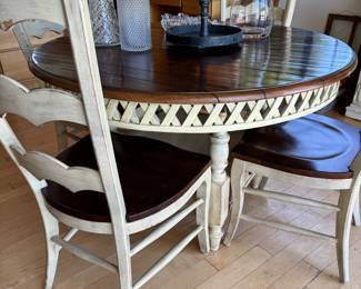 Round dining table with 1 leaf and 6 chairs