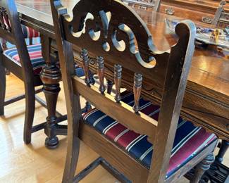 Antique Dining set with butterfly leaf extensions and 6 chairs. Includes table cover.