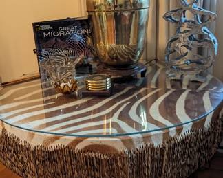 Zebra drum table purchased in the 1960s in Uganda. Beautiful reticulated brass table lamp with teak base.
