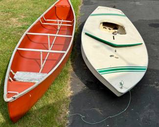 Canoe and sunfish sail boat