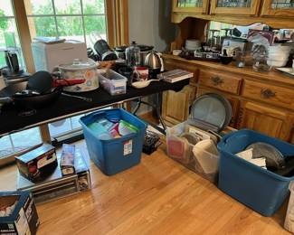 Bins full of kitchen wares 