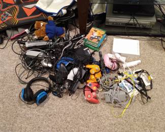 Huge amount controllers, games Wii related, etc