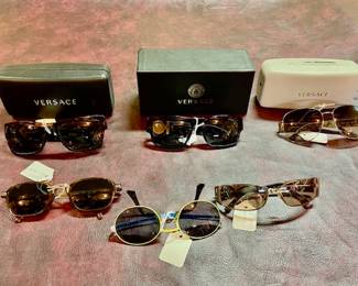 Great variety of vintage sunglasses to include Versace, Cartier, Ray Ban and a late 60's Peter Max!