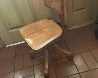 Vintage wooden rolling chair