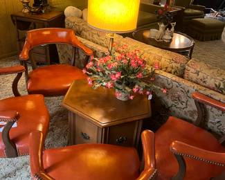 4 orange vinyl 1950 chairs pristine condition with a commode table
