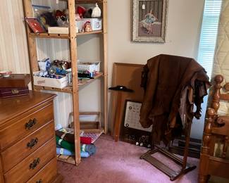 Wooden shelf and leather items