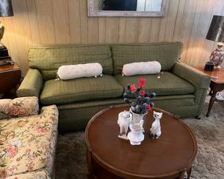 Green down filled couch from 1950, circle coffee table vintage cats