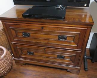 Lateral file cabinet with keys