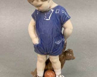 Royal Copenhagen Figureine Of A Boy With Teddy Bear
