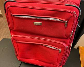Red Large Suitcase $ 20.00