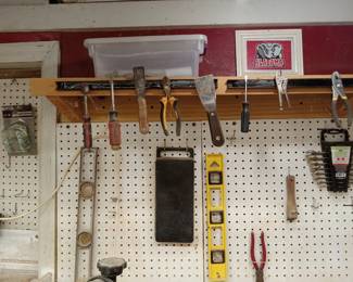 Levels, pliers. Wrenches, screwdrivers, tools of all kinds.