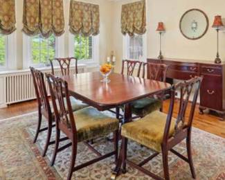 Chinese Chippendale Double Pedestal Mahogany Dining Table with 2 leaves (storage integral to table).   Six Chairs. Buffet.   Window Treatments available for sale.