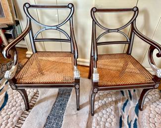 Pair of Regency Style Painted armchairs with cane seats.