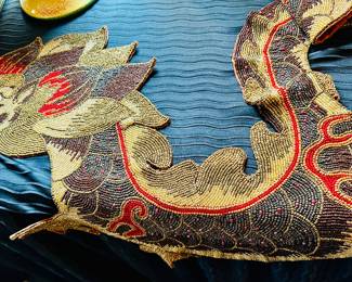 Beaded table runner in the form of a dragon