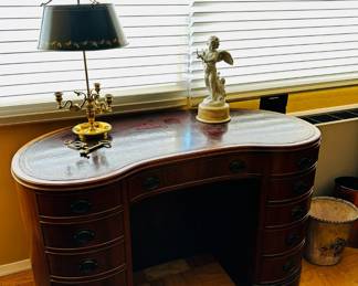 Antique kid ey shaped mahogany desk. 