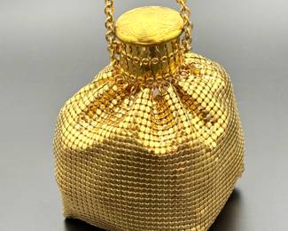 #221 • Whiting & Davis Company Golden Metal Mesh Accordion Pouch
WWW.LUX.BID