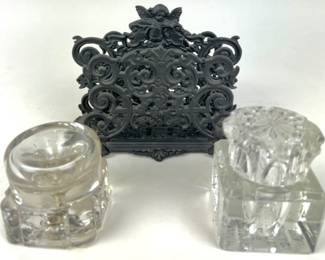 #234 • Two Glass Inkwells and One Cast Iron Letter Holder
WWW.LUX.BID