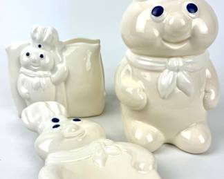 #128 • Pillsbury Poppin’ Fresh Doughboy Bank, Napkin Holder and Spoon Rest
WWW.LUX.BID