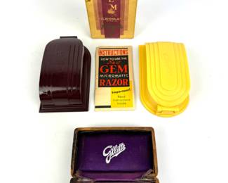 #79 • Three Vintage Travel Razors in Bakelite & Wood Boxes
WWW.LUX.BID