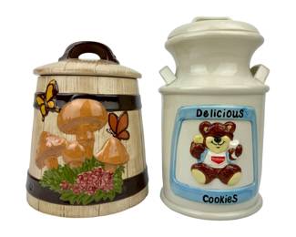 #318 • Two Cookie Jars - '80's "Delicious Cookies" Milk Jug and 70's Gare Barrel with Mushrooms & Butterflies
WWW.LUX.BID
