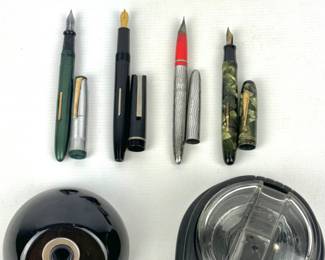 #232 • Two Esterbrook Pen Holders and Four Fountain Pens
WWW.LUX.BID