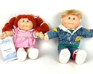 #99 • Vintage Set Of Cabbage Patch Dolls- Boy And Girl
WWW.LUX.BID