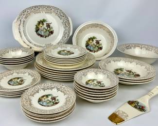 #215 • 22K Gold Triumph American Limoges China Set
WWW.LUX.BID