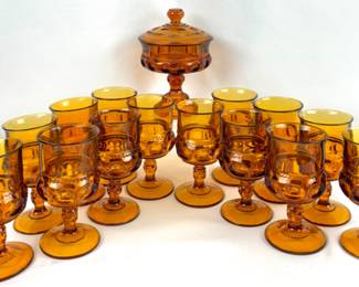 #194 • Indiana Glass King’s Crown Amber Glass Covered Dish and 14 Goblets
WWW.LUX.BID