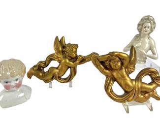 #301 • 2 Porcelain Doll Heads and 2 Chalkware Angel Wall Decor
WWW.LUX.BID