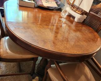 Wonderful Table (leaf in place) and 6 Matching Chairs. It's been covered and in very good condition. 