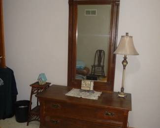 dresser / with a tall mirror 