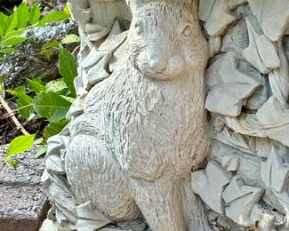 Large Concrete Bench with Rabbits sculpted into each side of the base.