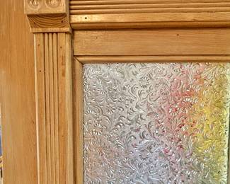 One of three custom doors that are for sale in this house.