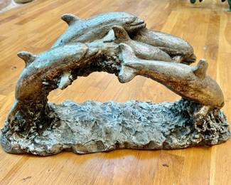 Stunning pewter dolphin sculpture-signed.