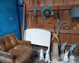 Garden figurines, leather chair