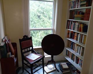 Books, Eastlake chair,  tilt top table