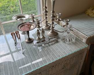 Wicker chests,  Sterling Silver pieces, carving sets and vintage perfume bottles.  