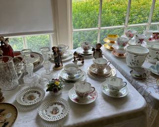 Large collection of cups and saucers.