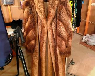 Very nice coat properly stored for years. Burtrum Fur.