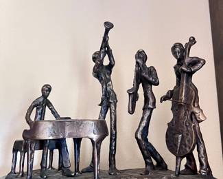 Lots of music decor in brass copper and mostly bronze