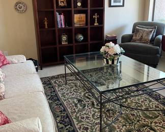 Bookcase, Slipcovered Sofa, Area Rug, Iron Coffee Table