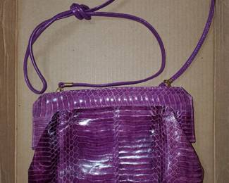 Snake skin purple purse...there's a pair of size 6.5 shoes too!
