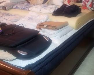 King sleigh bed with Stearns and Foster like-new mattress