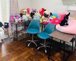 Lots of kids toys, kids games, school supplies. Desk chairs and desks 